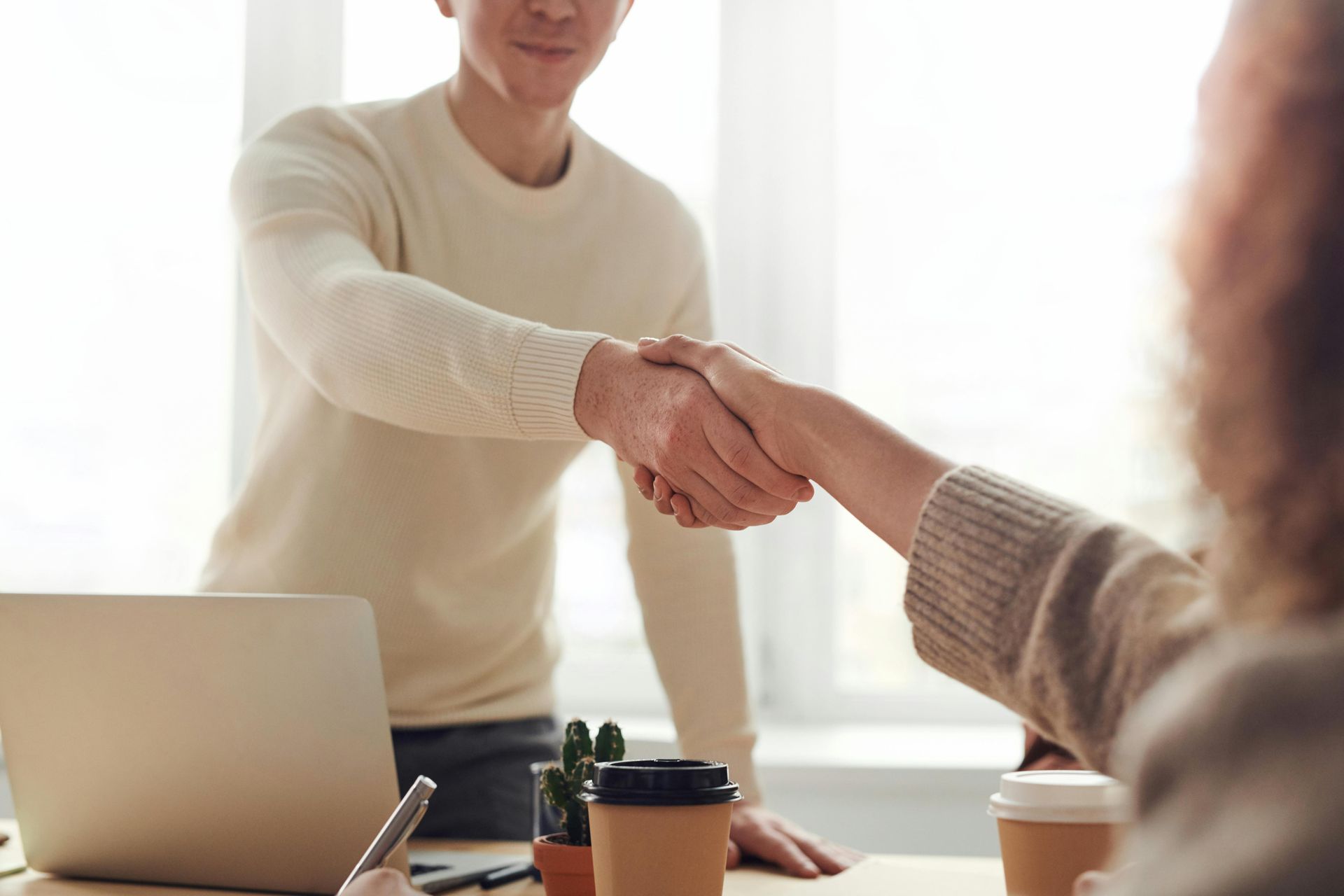 Insurance professionals shaking hands