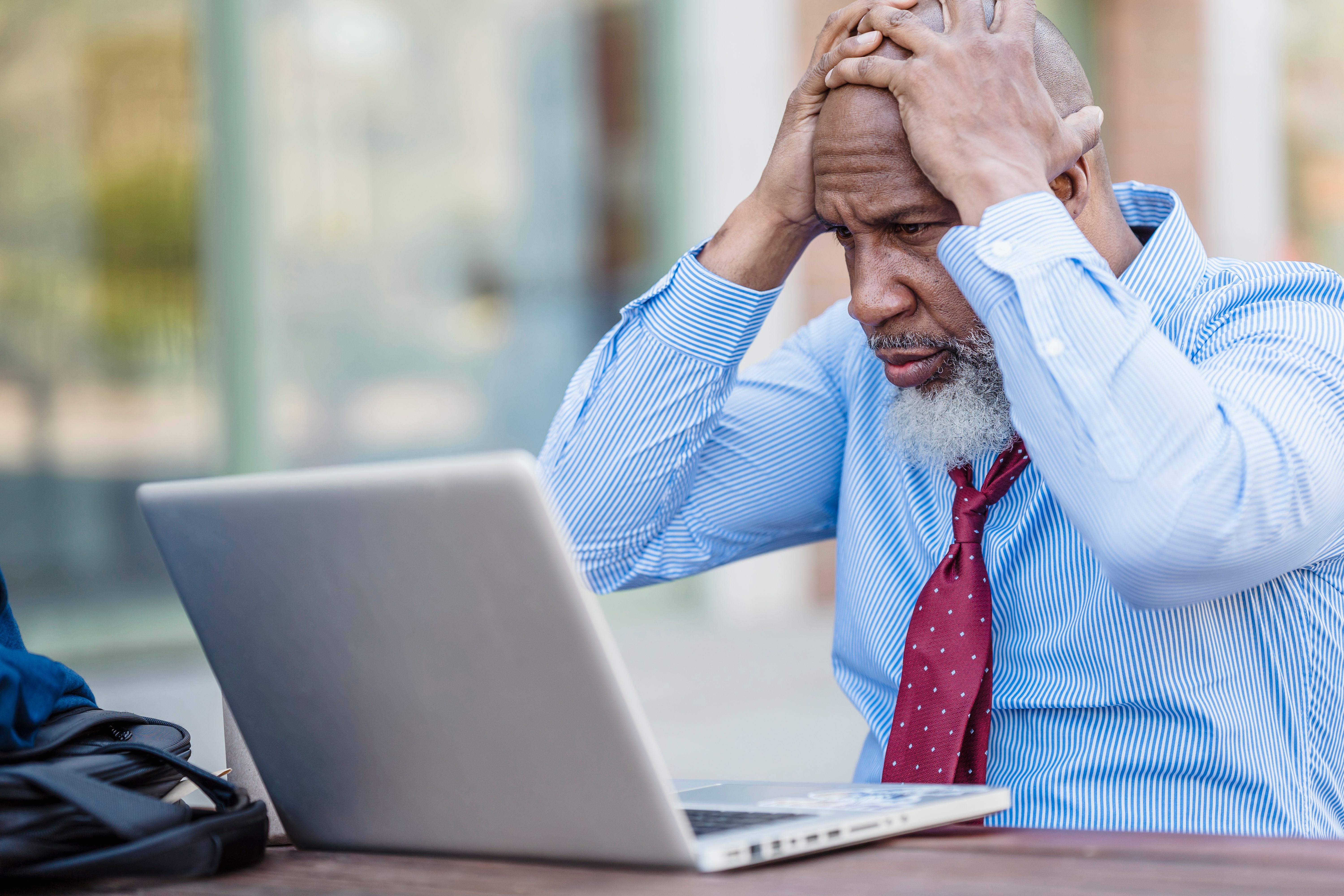 Senior reviewing Medicare enrollment paperwork